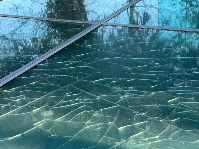 Picture of cracked glass of a monument